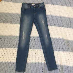 Medium Wash Lightly Distressed Skinny Jean